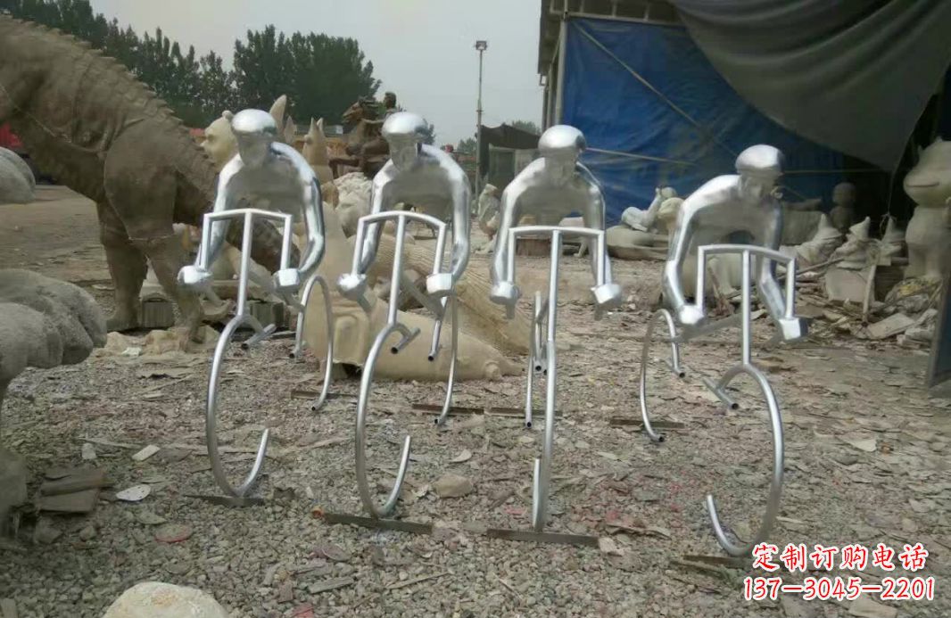 辽阳不锈钢广场抽象骑自行车人物雕塑