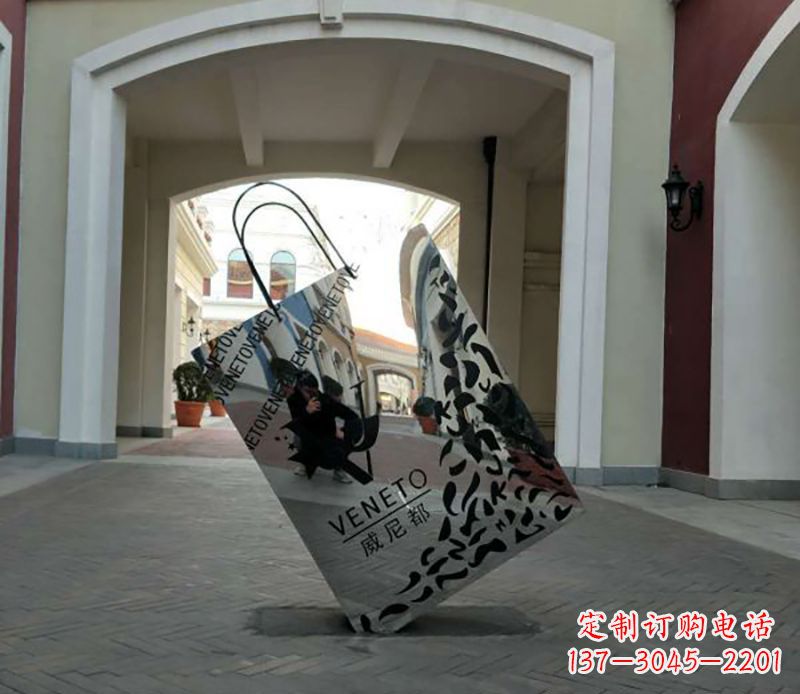 辽阳不锈钢镂空购物袋雕塑——艺术精美的装饰品