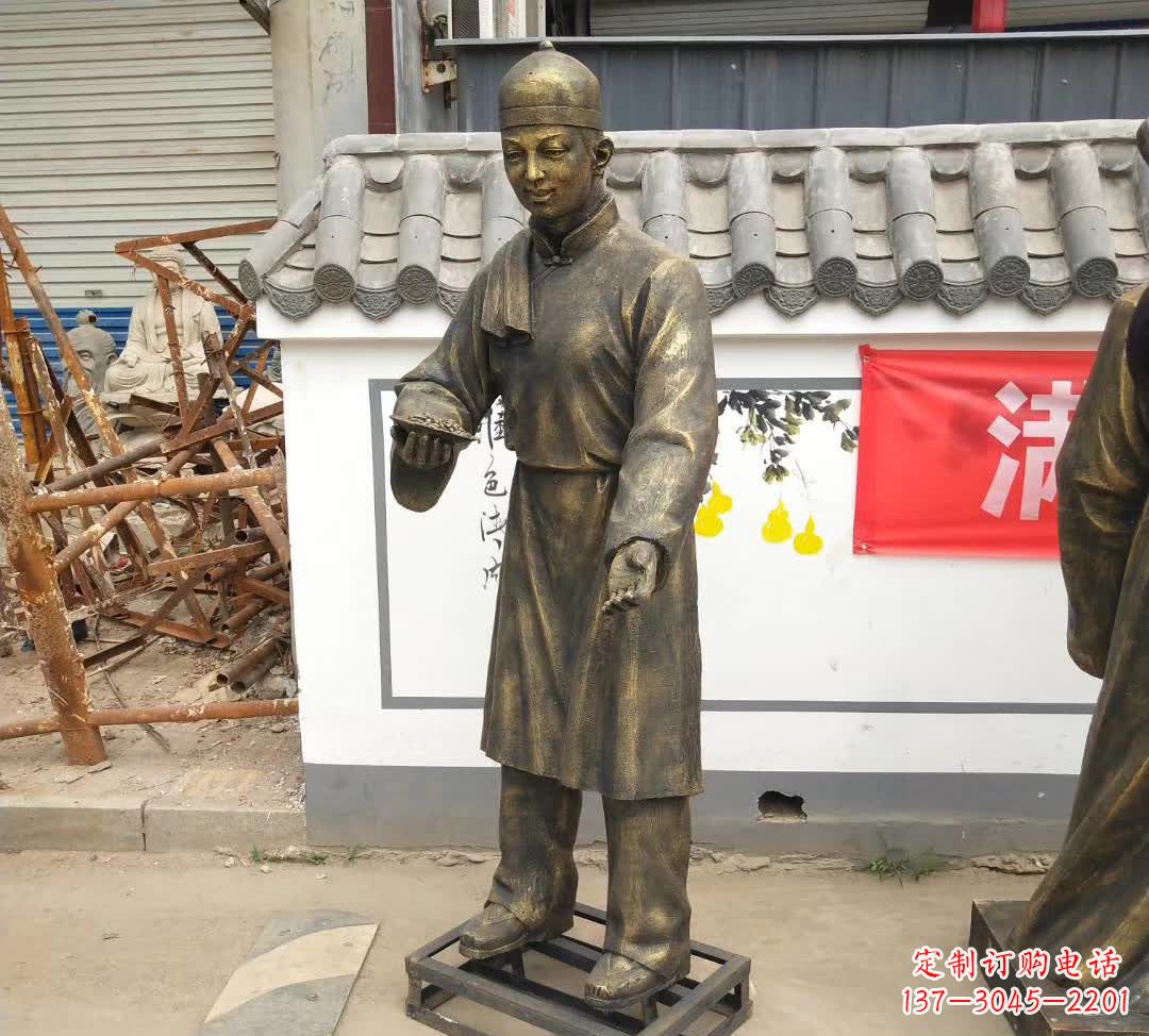 辽阳传承百年店小二铜雕