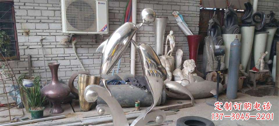 辽阳艺术品般的不锈钢海豚顶球雕塑