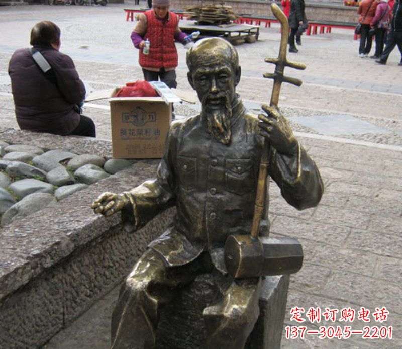 辽阳公园拉二胡的老人小品铜雕