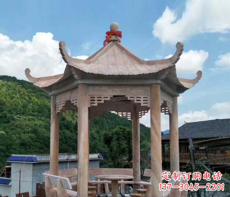 辽阳一流的公园晚霞红六角石雕凉亭