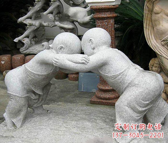 辽阳可爱小孩摔跤石雕