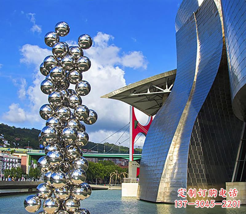 辽阳高端不锈钢抽象龙柱雕塑