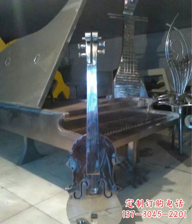 辽阳中领雕塑:优雅音乐之旅,为您带来不锈钢吉他景观雕塑!