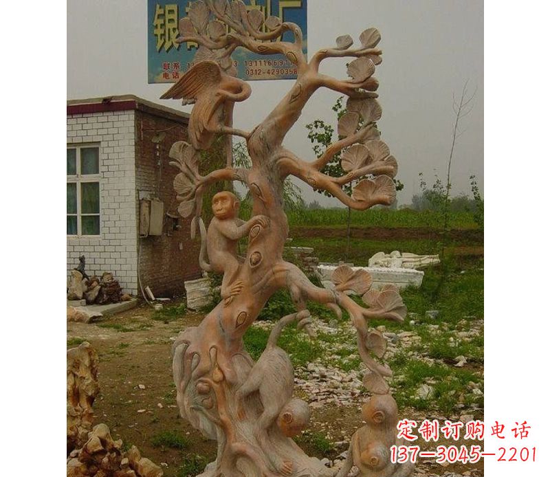 辽阳猴子上树摘桃石雕