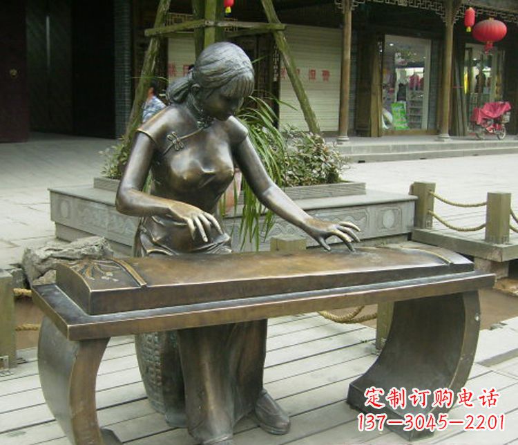 辽阳铜雕现代人物弹古筝雕塑