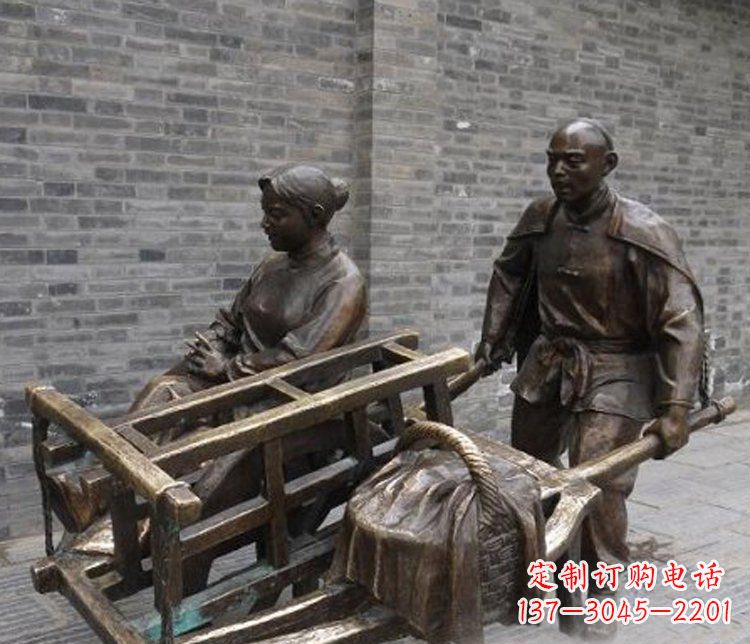 辽阳推独轮车的人物铜雕