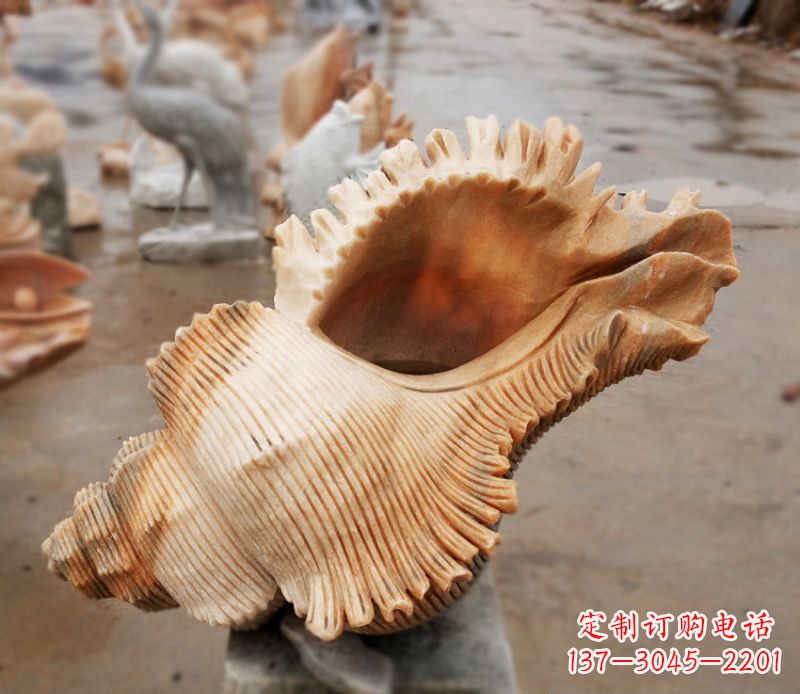 辽阳晚霞红海螺石雕广场景观雕塑
