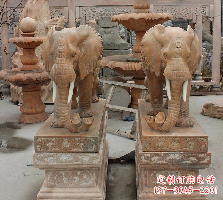 辽阳晚霞红石雕元宝大象
