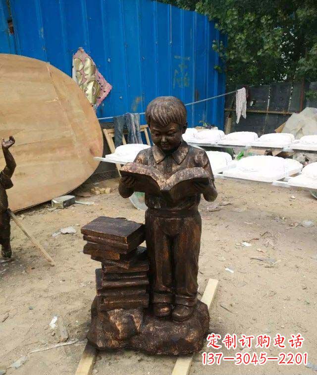 辽阳小孩看书玻璃钢仿铜人物雕塑