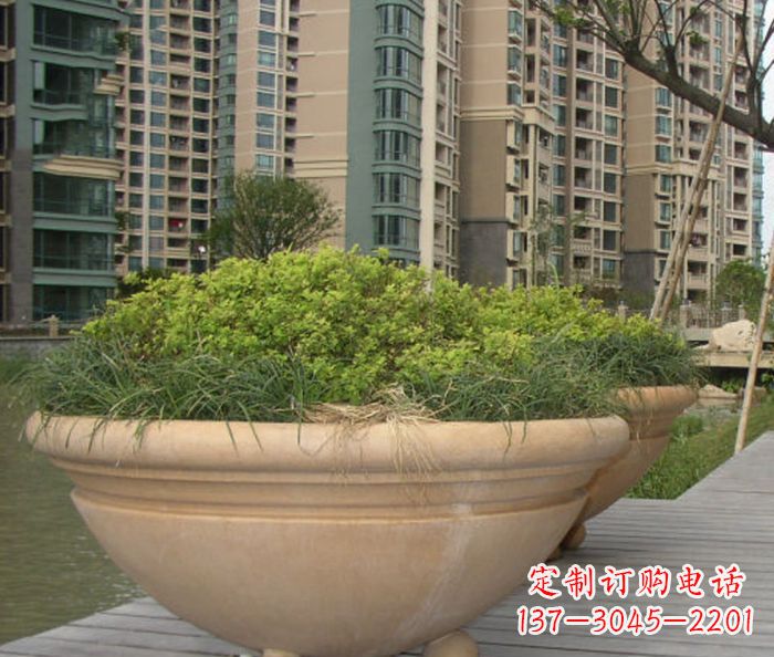 辽阳小区景观晚霞红花盆石雕