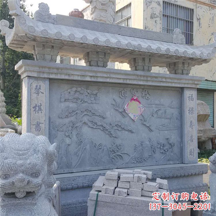 辽阳迎客松石雕影壁墙