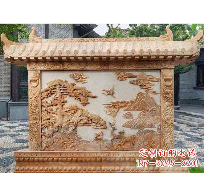 辽阳园林景观晚霞红松鹤石浮雕影壁