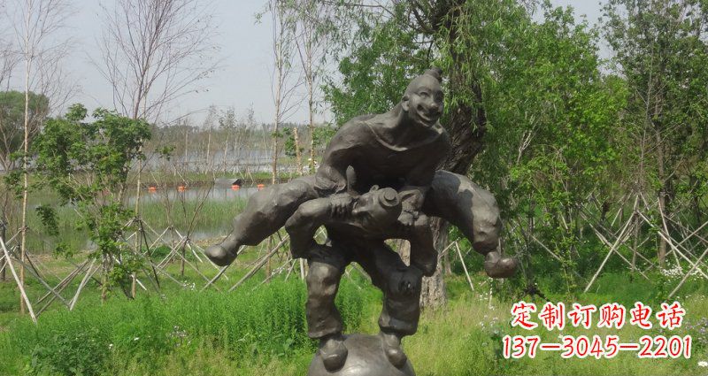 辽阳园林站在球上面跳山羊的人物景观铜雕