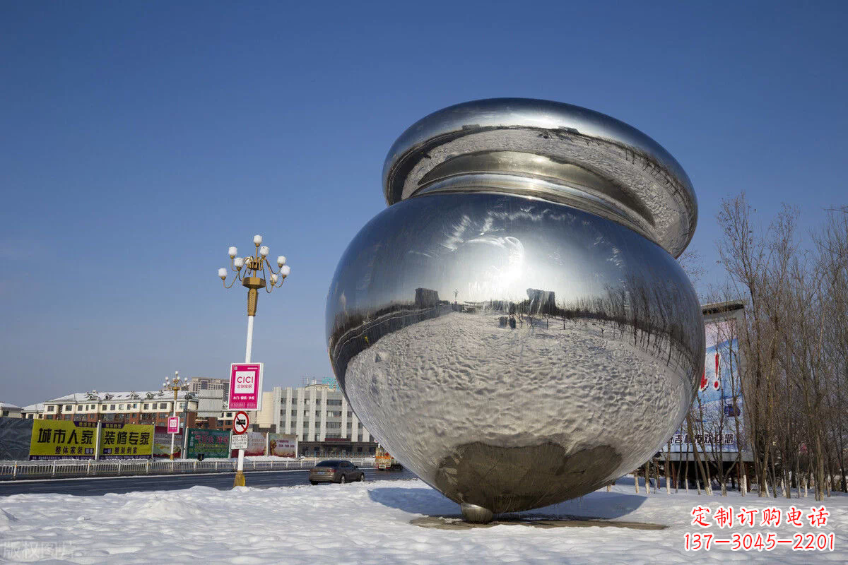 辽阳陀螺雕塑-户外广场大型景观不锈钢镜面陀螺雕塑